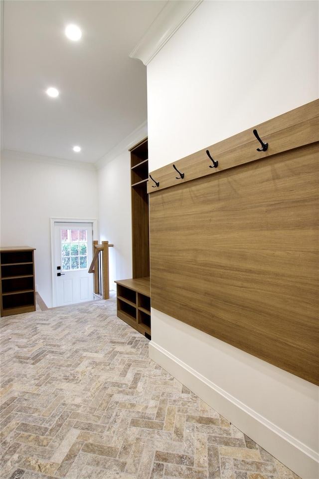 mudroom with recessed lighting and crown molding