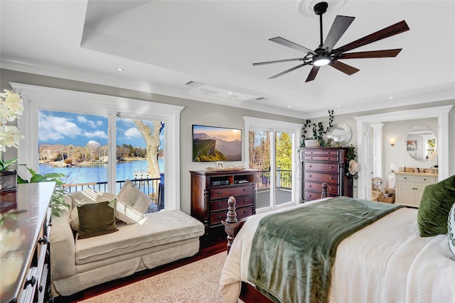 bedroom with recessed lighting, wood finished floors, access to exterior, and ornamental molding