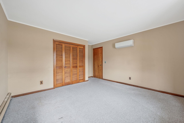 unfurnished bedroom featuring crown molding, baseboards, a wall mounted air conditioner, baseboard heating, and a closet