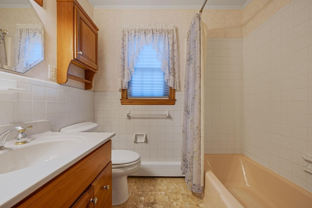 full bath featuring baseboard heating, crown molding, toilet, and tile walls