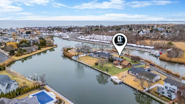 drone / aerial view featuring a water view