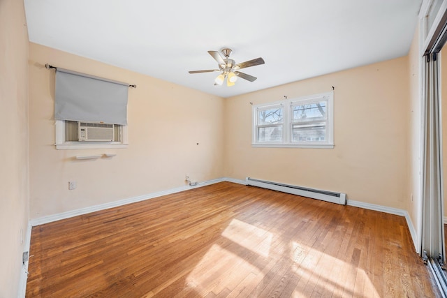 empty room with light wood-style floors, baseboards, baseboard heating, and a ceiling fan