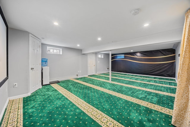 unfurnished bedroom featuring recessed lighting, baseboards, and carpet floors