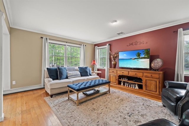 33 Sutherland Dr, Highland Mills, NY 10930 - living area featuring a baseboard heating unit, hardwood / wood-style floors, and ornamental molding