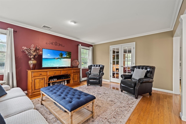 33 Sutherland Dr, Highland Mills, NY 10930 - living room featuring french doors, ornamental molding, light wood finished floors, and baseboards