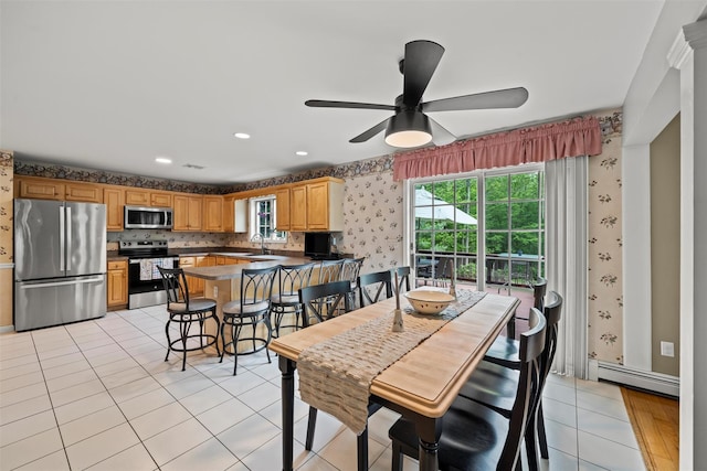 33 Sutherland Dr, Highland Mills, NY 10930 - dining room with wallpapered walls, baseboard heating, a ceiling fan, light tile patterned floors, and recessed lighting