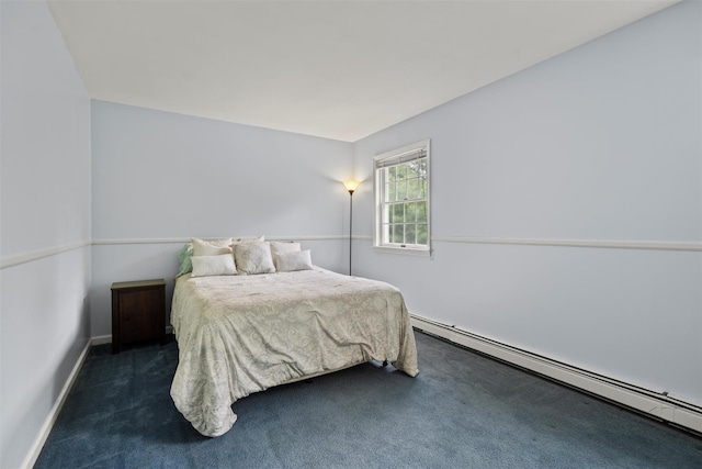 33 Sutherland Dr, Highland Mills, NY 10930 - bedroom with baseboard heating, dark colored carpet, and baseboards