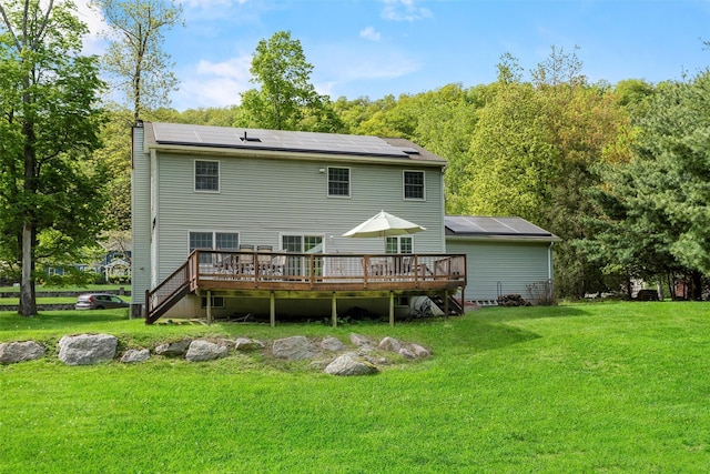 33 Sutherland Dr, Highland Mills, NY 10930 - back of property featuring a wooden deck, stairs, and a yard