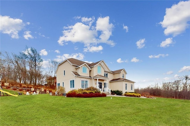 11 Dorian Way, Campbell Hall, NY 10916 - view of front facade featuring a front yard and stucco siding
