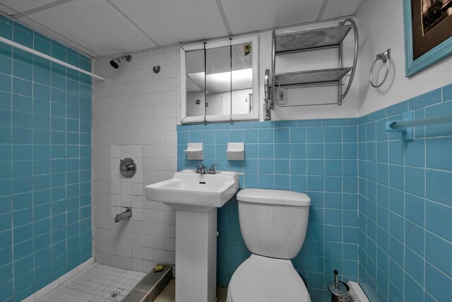 104-65 42nd Ave, Corona, NY 11368 - full bath featuring wainscoting, toilet, tiled shower, and tile walls