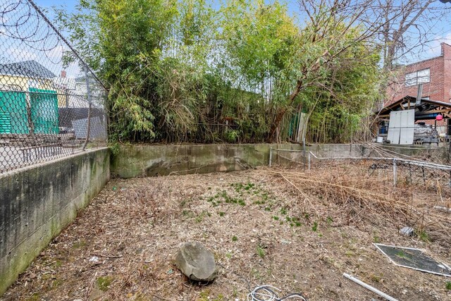 104-65 42nd Ave, Corona, NY 11368 - view of yard featuring fence