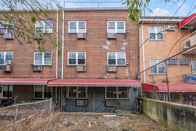 104-65 42nd Ave, Corona, NY 11368 - back of property with fence and brick siding