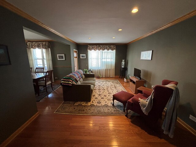 67-66 108th St Unit B64, Forest Hills, NY 11375 - living room featuring wood finished floors, baseboards, and a wealth of natural light