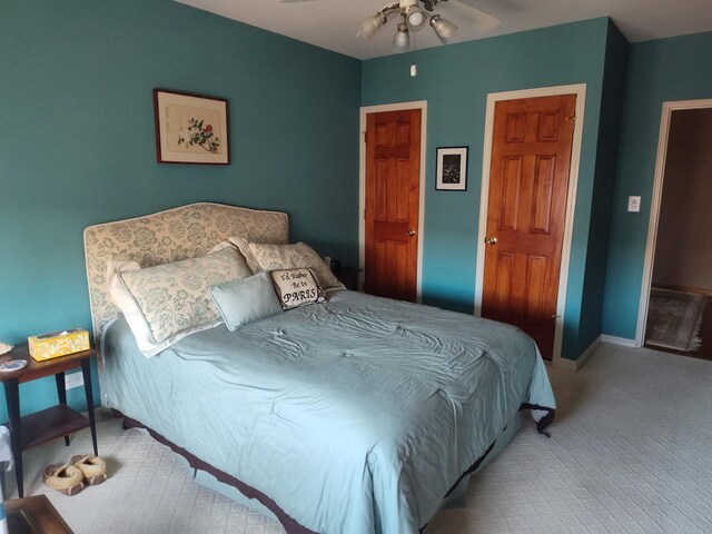 67-66 108th St Unit B64, Forest Hills, NY 11375 - carpeted bedroom with baseboards and ceiling fan