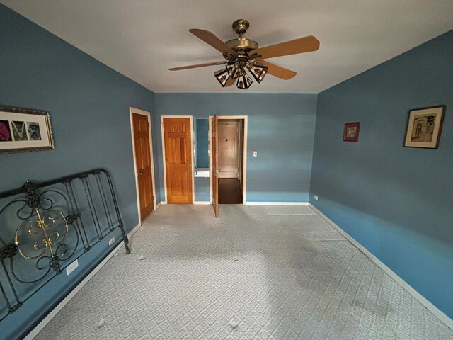 67-66 108th St Unit B64, Forest Hills, NY 11375 - bedroom featuring baseboards and a ceiling fan