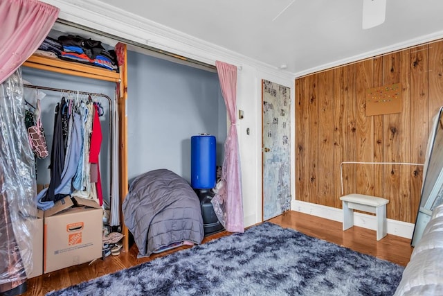 bedroom with wood finished floors