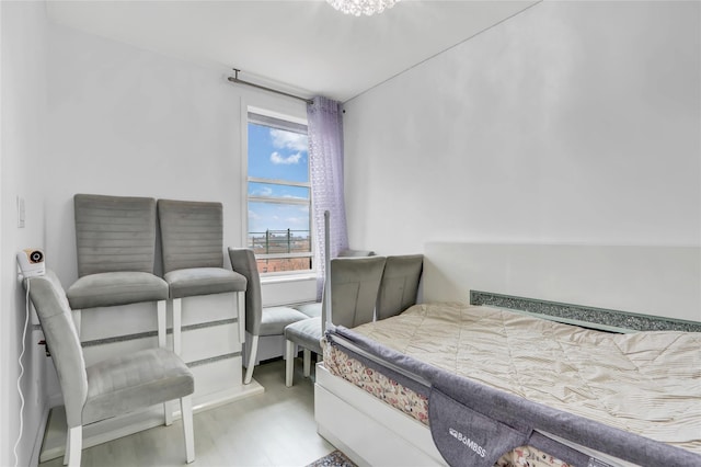 bedroom featuring light wood-style floors