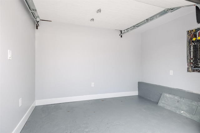 garage featuring baseboards