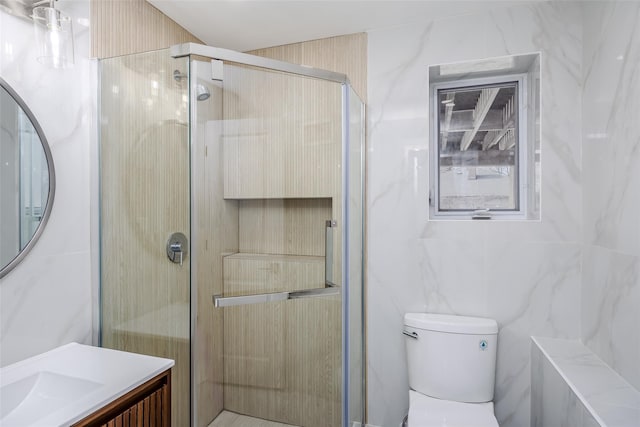 full bath featuring tile walls, toilet, a stall shower, and vanity