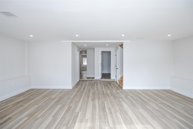 unfurnished room featuring baseboards, visible vents, recessed lighting, and light wood-style floors