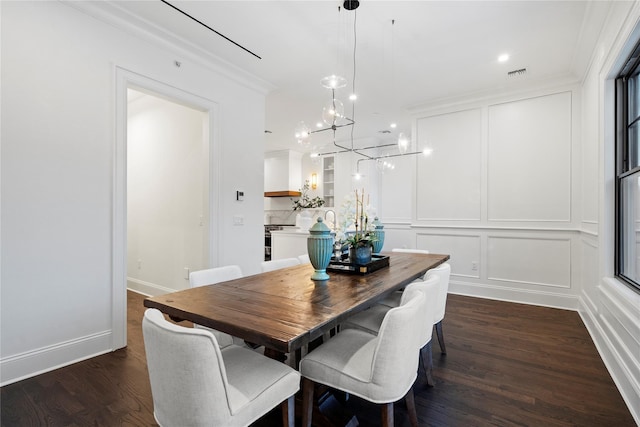 133 Spring Rd Unit 8, Huntington, NY 11743 - dining space featuring visible vents, a chandelier, ornamental molding, dark wood-style floors, and a decorative wall