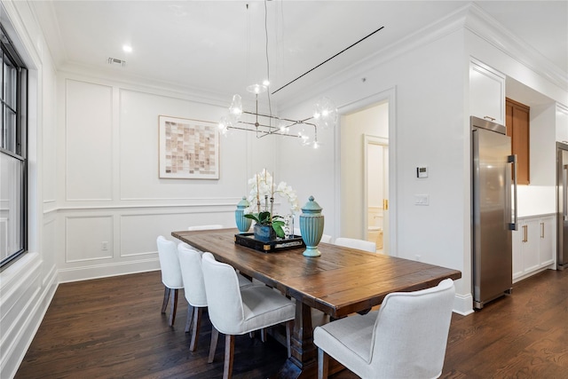 133 Spring Rd Unit 8, Huntington, NY 11743 - dining space with an inviting chandelier, a decorative wall, and crown molding