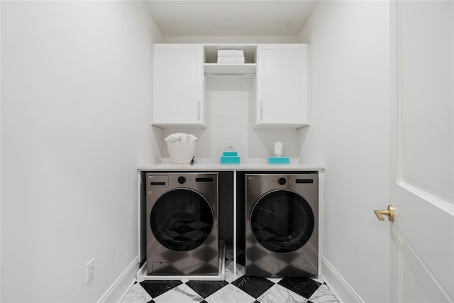 133 Spring Rd Unit 8, Huntington, NY 11743 - laundry area with baseboards, cabinet space, marble finish floor, and independent washer and dryer