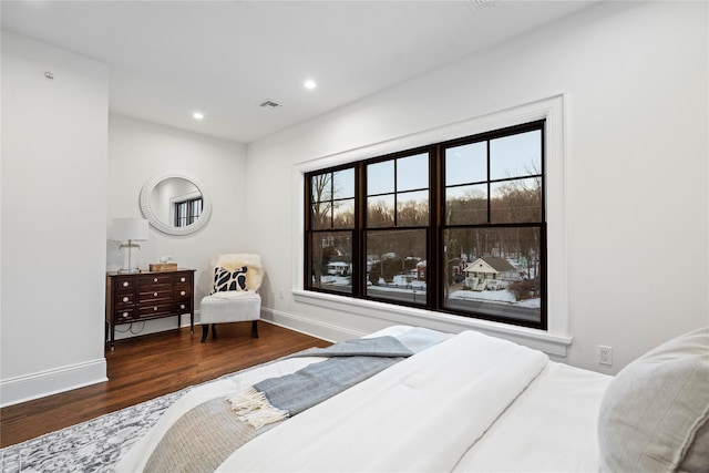 133 Spring Rd Unit 8, Huntington, NY 11743 - bedroom with visible vents, recessed lighting, baseboards, and wood finished floors