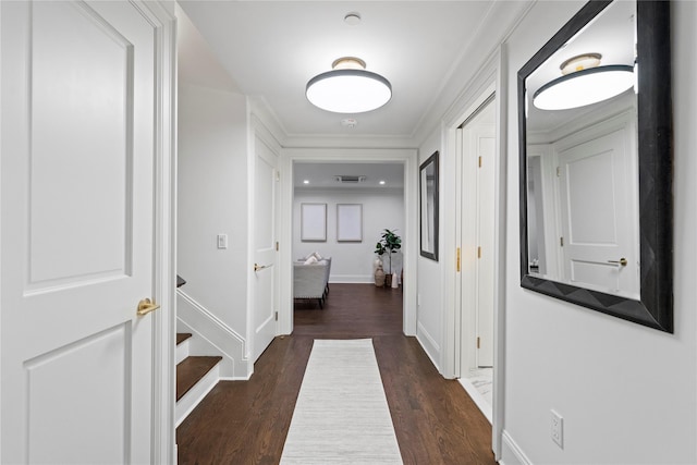 133 Spring Rd Unit 8, Huntington, NY 11743 - hallway featuring dark wood-style floors, baseboards, and ornamental molding
