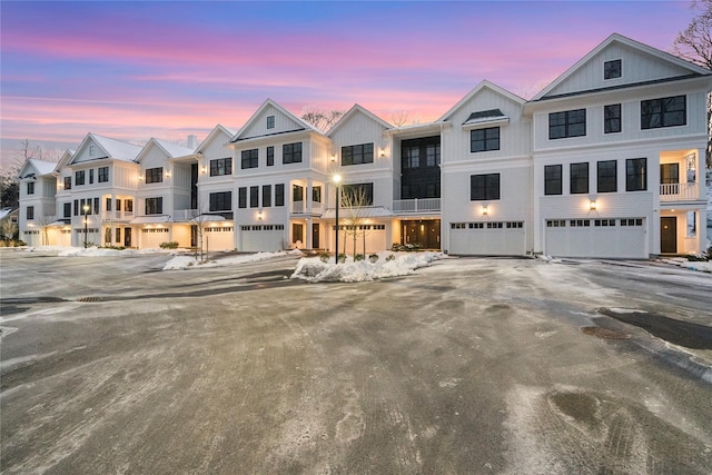 133 Spring Rd Unit 8, Huntington, NY 11743 - view of property with aphalt driveway and a garage