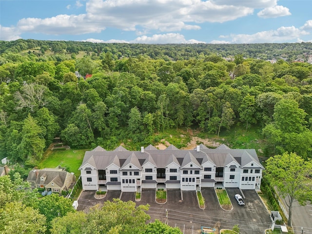 133 Spring Rd Unit 8, Huntington, NY 11743 - bird's eye view featuring a forest view