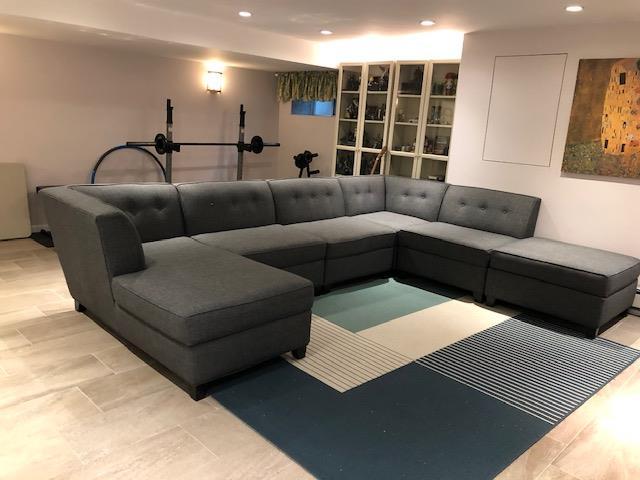 12-31 Robin Ln Unit 52L, Bayside, NY 11360 - living room featuring recessed lighting