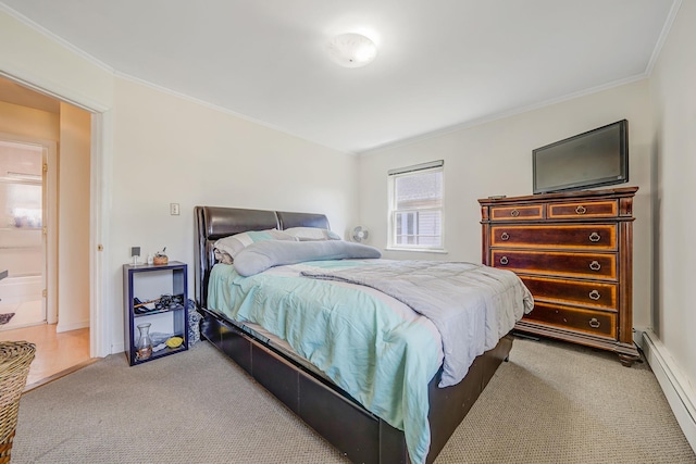 carpeted bedroom with ornamental molding and a baseboard heating unit