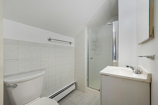full bathroom with baseboard heating, tile patterned flooring, tile walls, vaulted ceiling, and a stall shower