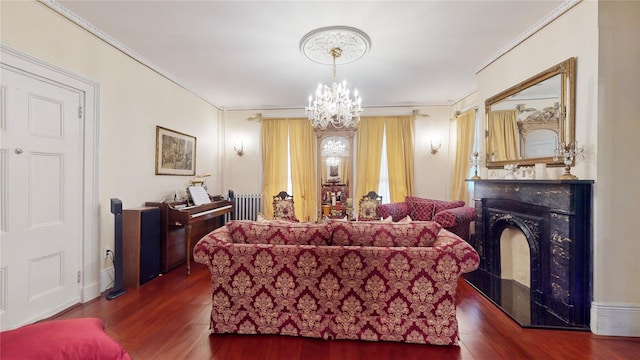 32-25 30th St, Long Island City, NY 11106 - living room with ornamental molding, wood finished floors, a high end fireplace, radiator, and a chandelier