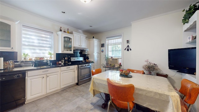 32-25 30th St, Long Island City, NY 11106 - kitchen with white cabinetry, a sink, under cabinet range hood, dishwasher, and gas range