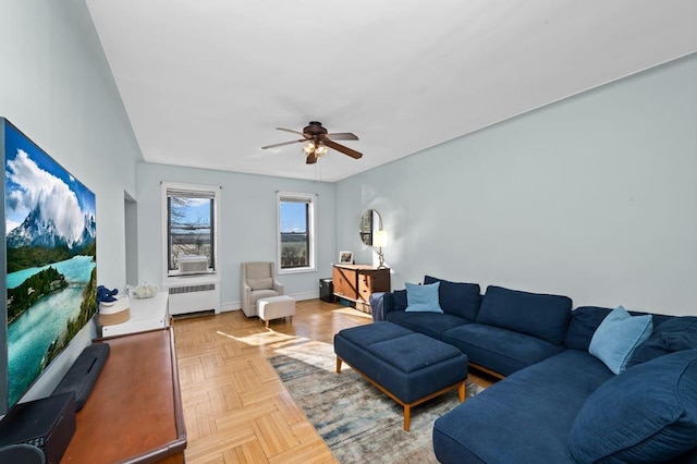 9701 Shore Rd Unit 1O, Brooklyn, NY 11209 - living area with baseboards, radiator heating unit, and ceiling fan