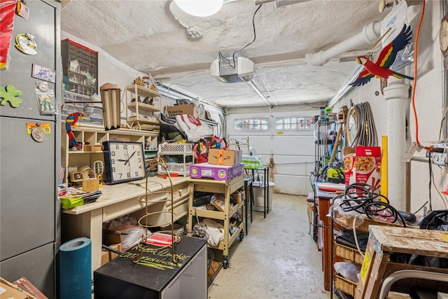 garage featuring a workshop area and a garage door opener