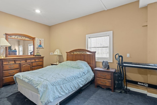 bedroom featuring recessed lighting and dark colored carpet