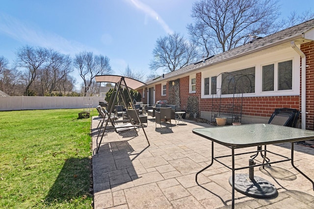 view of patio / terrace featuring outdoor dining space and fence