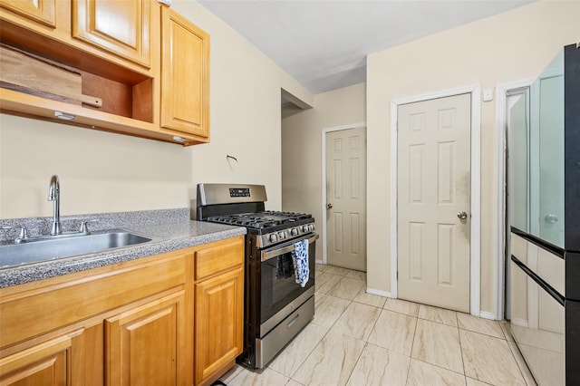 kitchen with baseboards, open shelves, stainless steel range with gas stovetop, a sink, and marble finish floor