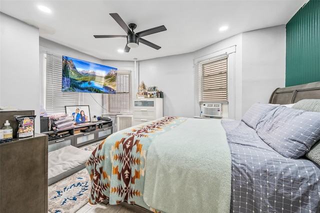bedroom with recessed lighting, cooling unit, and a ceiling fan