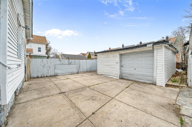 detached garage with fence