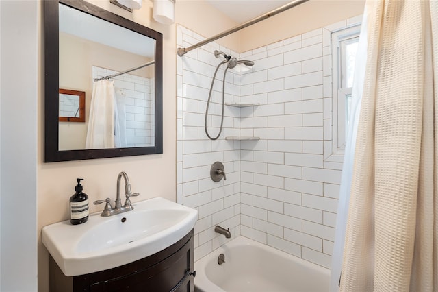 bathroom with shower / bath combo and vanity