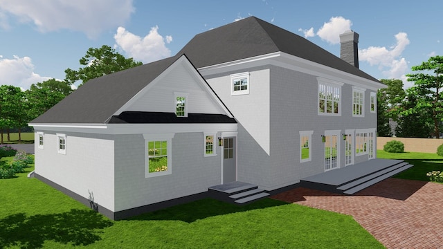 back of property featuring a chimney, brick siding, and a lawn