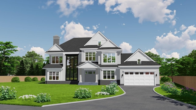 view of front of home featuring a chimney, a front yard, fence, and aphalt driveway