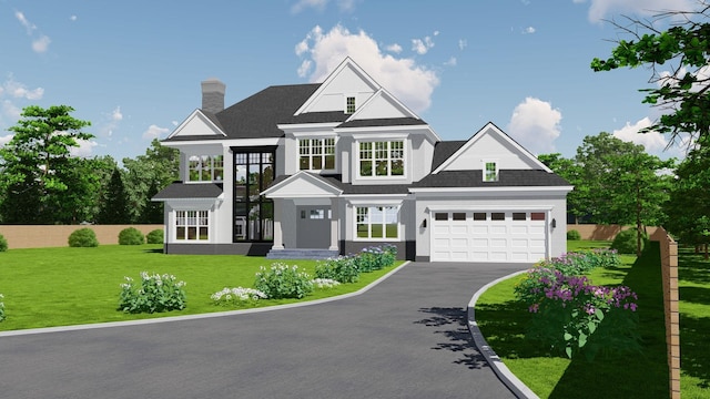 view of front of property with a front yard, driveway, fence, and an attached garage