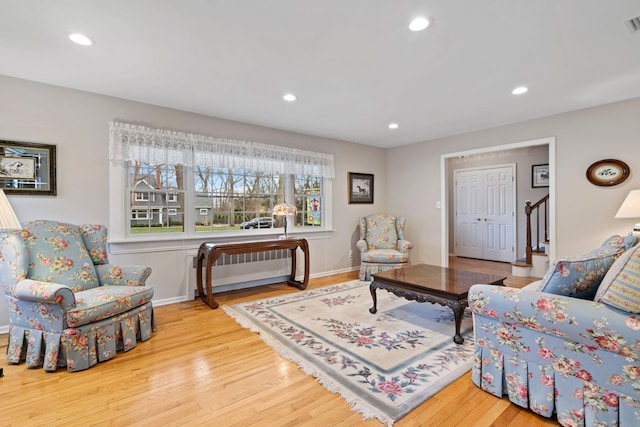 14 Hillside Ave, Saint James, NY 11780 - living room featuring wood finished floors, recessed lighting, stairs, and baseboards
