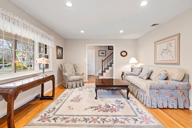 14 Hillside Ave, Saint James, NY 11780 - living room featuring recessed lighting, wood finished floors, stairway, and baseboards