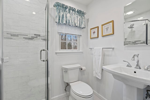14 Hillside Ave, Saint James, NY 11780 - full bathroom with a stall shower, toilet, and baseboards